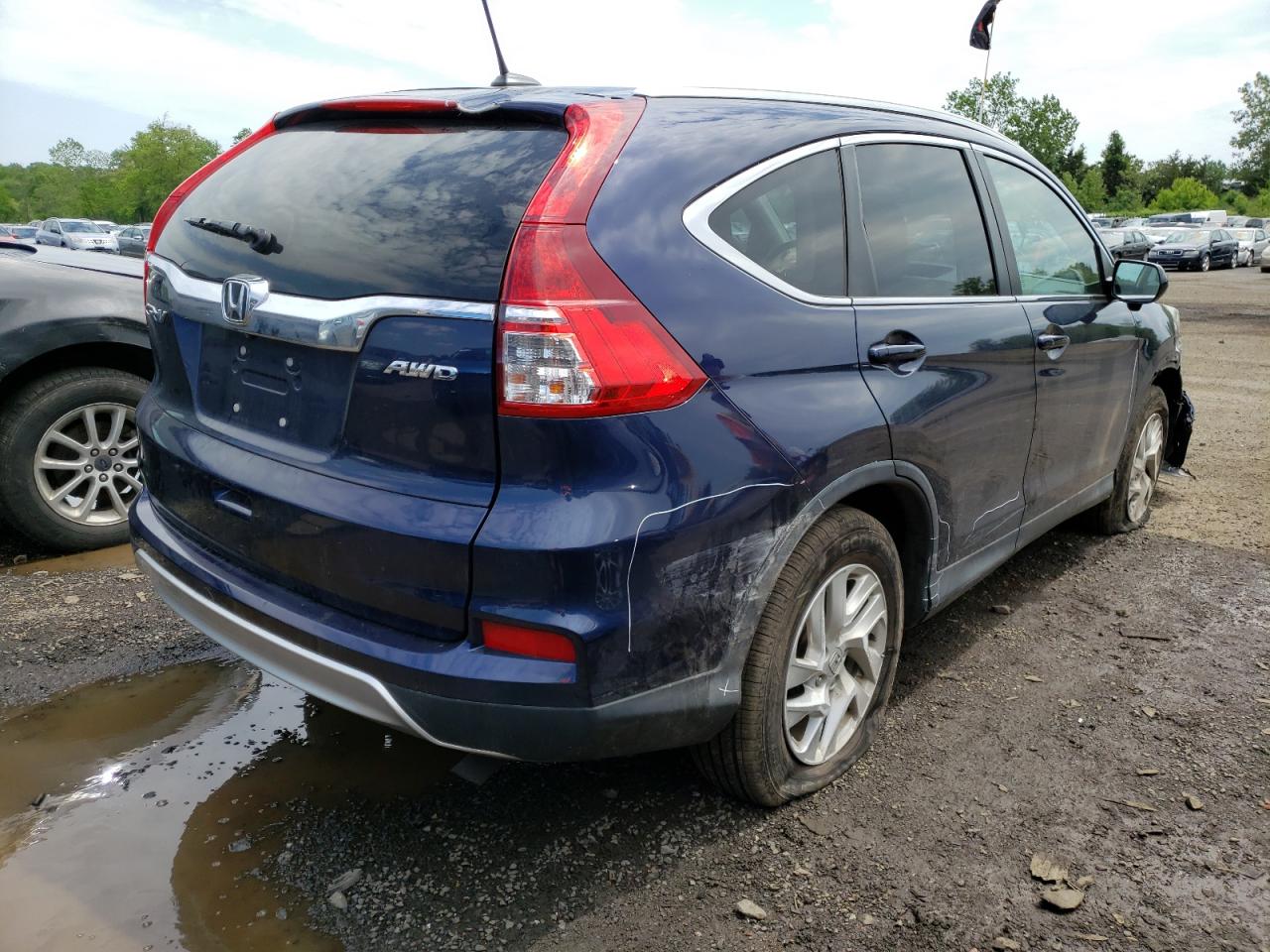 Photo 4 from auction – 2016 HONDA CR-V EXL with VIN 2HKRM4H77GH626324