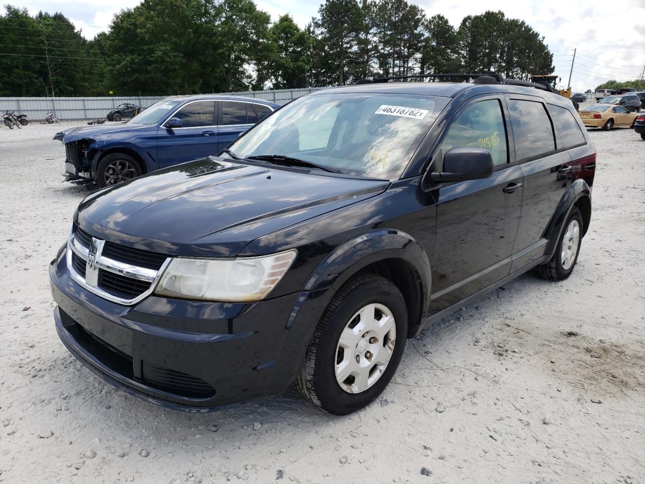 Photo 2 from auction – 2010 DODGE JOURNEY SE with VIN 3D4PG4FB4AT203829