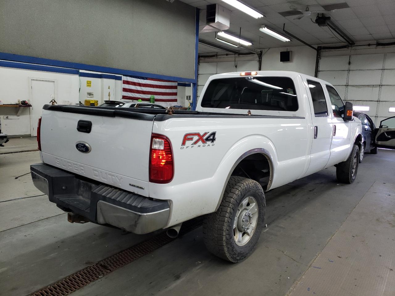 Photo 4 from auction – 2012 FORD F250 SUPER with VIN 1FT7W2B6XCEA67920