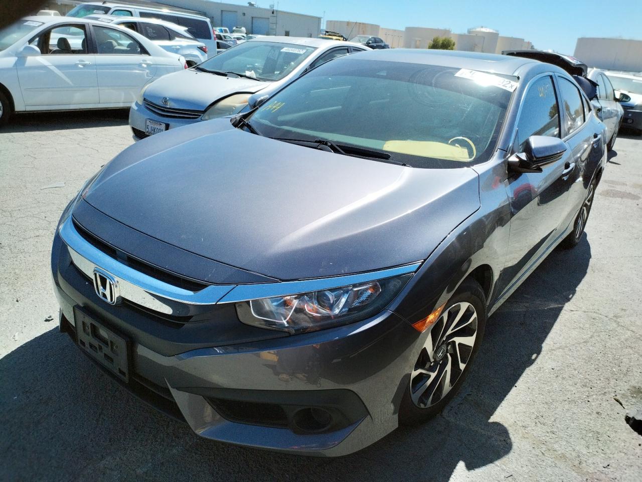 Photo 14 from auction – 2017 HONDA CIVIC EX with VIN 2HGFC2F84HH565225