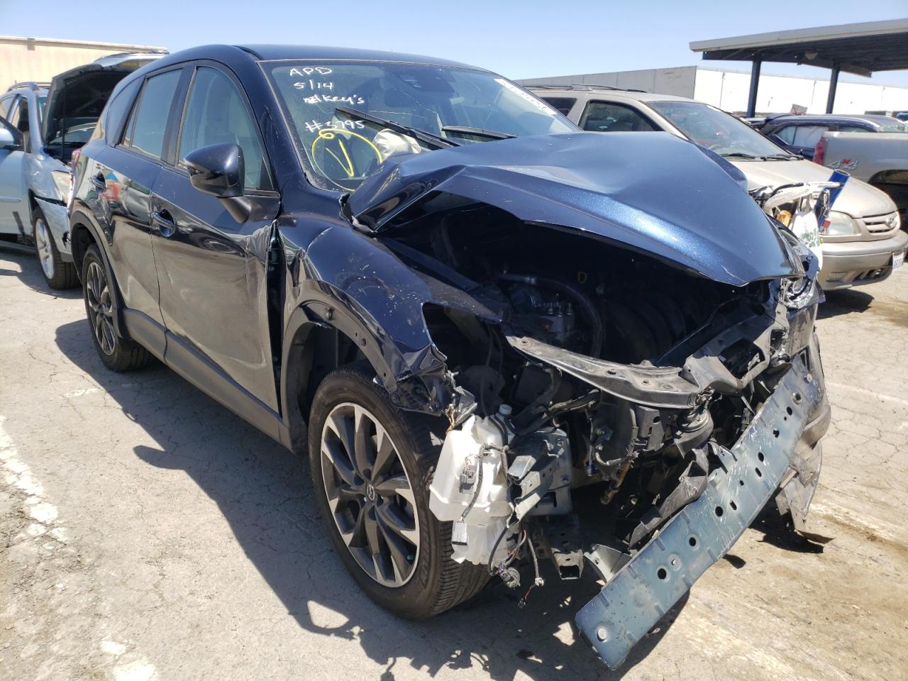 MAZDA CX-5 GT 2016 with VIN JM3KE2DY3G0773472 - Photo from auction