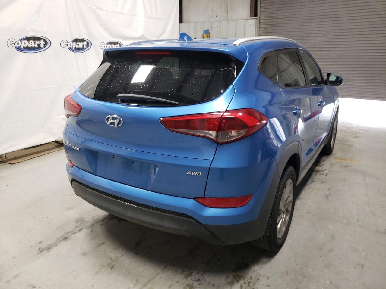 Photo 4 from auction – 2018 HYUNDAI TUCSON SEL with VIN KM8J3CA43JU637579