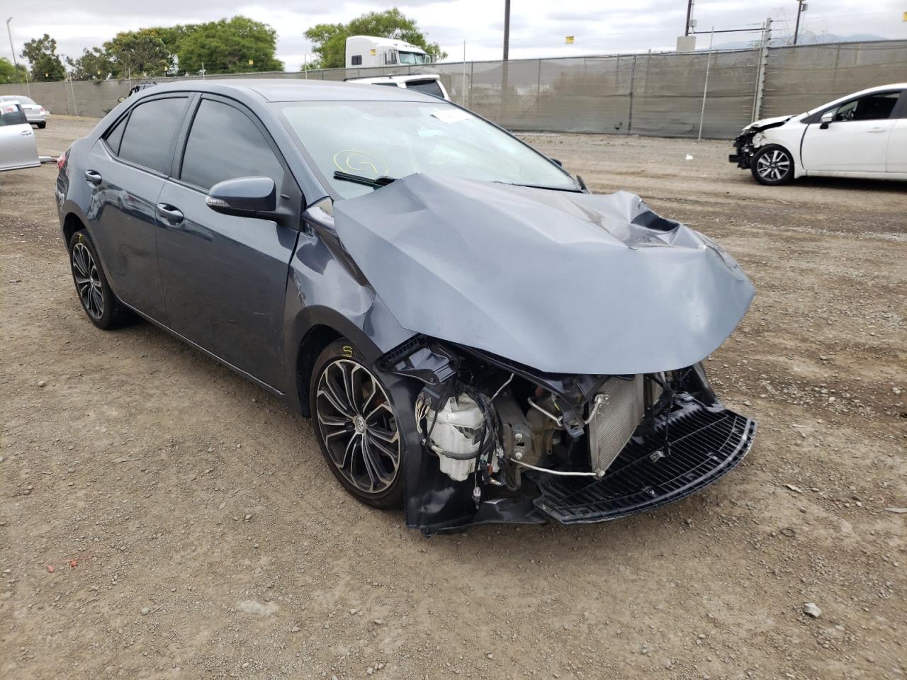 TOYOTA COROLLA L 2015 with VIN 5YFBURHE6FP295802 - Photo from auction
