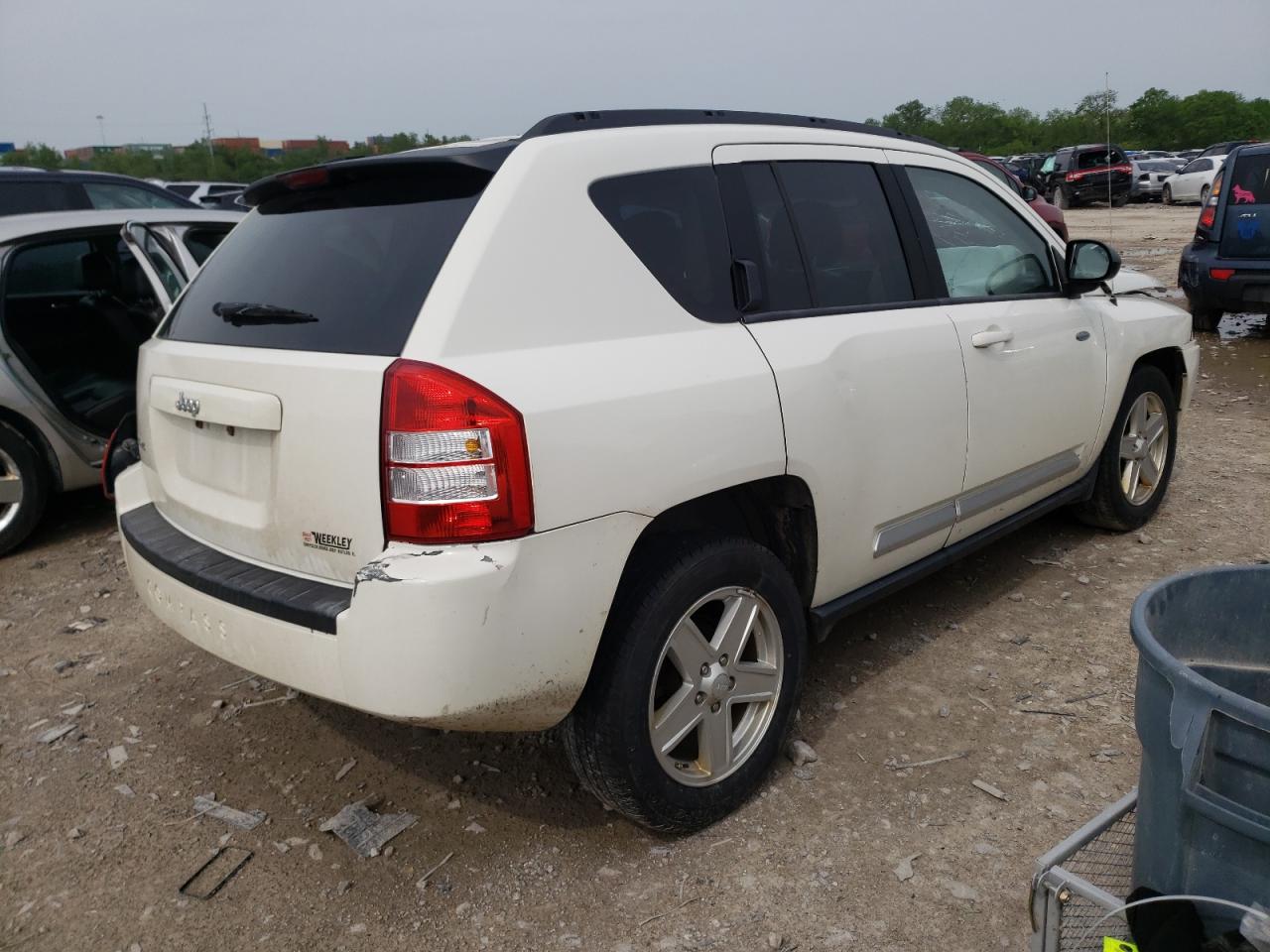 Photo 4 from auction – 2010 JEEP COMPASS SP with VIN 1J4NF1FB4AD623984