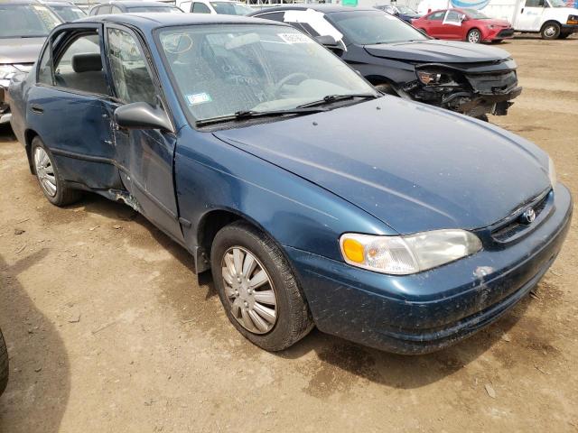 TOYOTA COROLLA VE 2000 with VIN 1NXBR12E0YZ369440 - Photo from auction