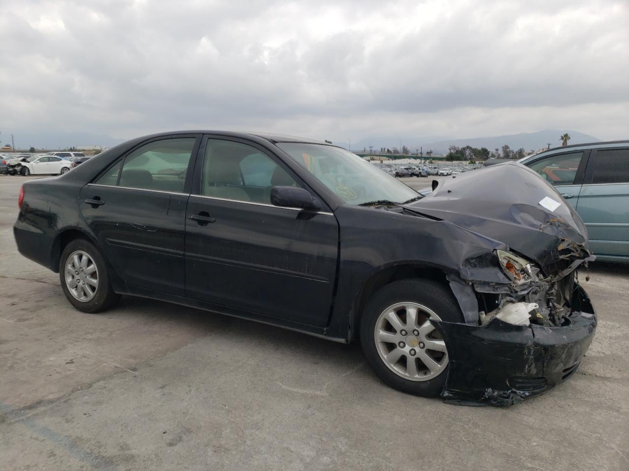 TOYOTA CAMRY LE 2004 with VIN 4T1BE32K54U353015 - Photo from auction