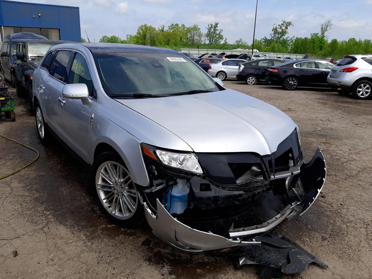 LINCOLN MKT 2014 with VIN 2LMHJ5AT4EBL54843 - Photo from auction