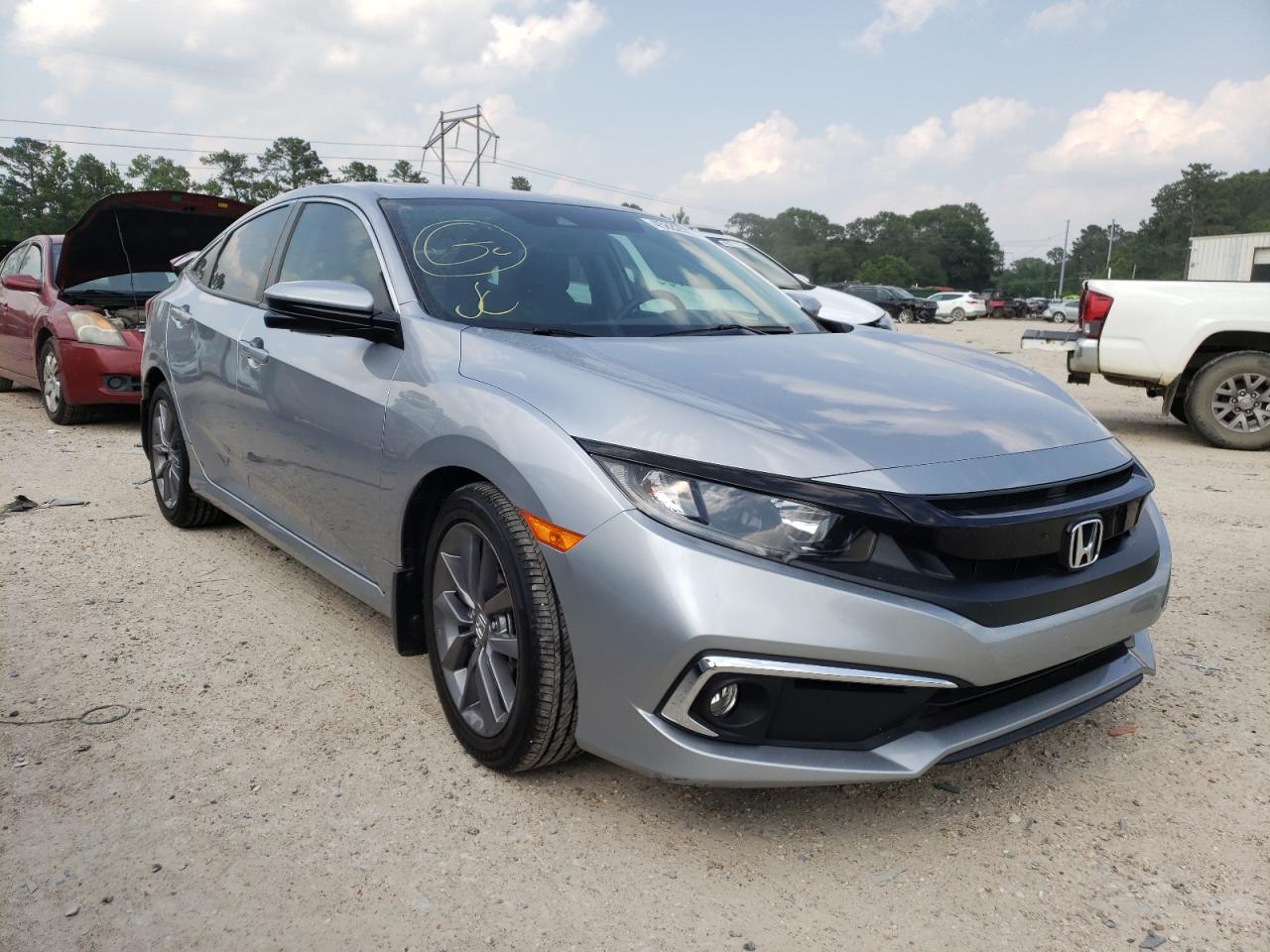 HONDA CIVIC EXL 2019 with VIN 19XFC1F76KE013373 - Photo from auction