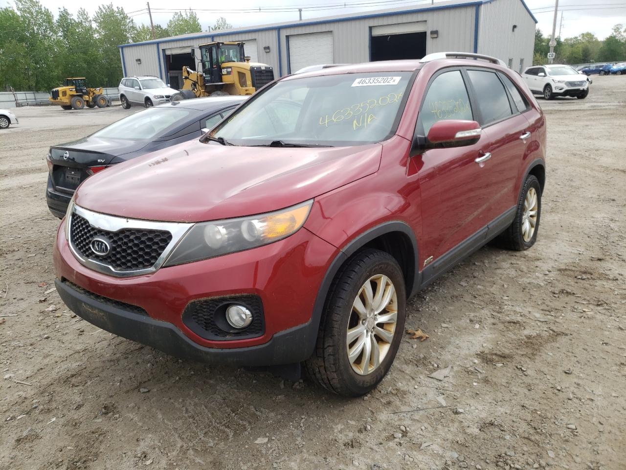 Photo 2 from auction – 2011 KIA SORENTO EX with VIN 5XYKUCA12BG036890