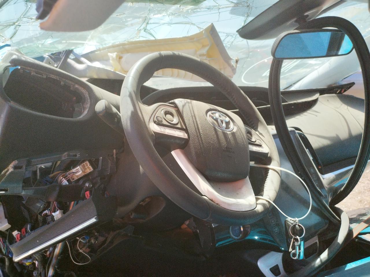 Photo 8 from auction – 2017 TOYOTA PRIUS PRIM with VIN JTDKARFP0H3047019