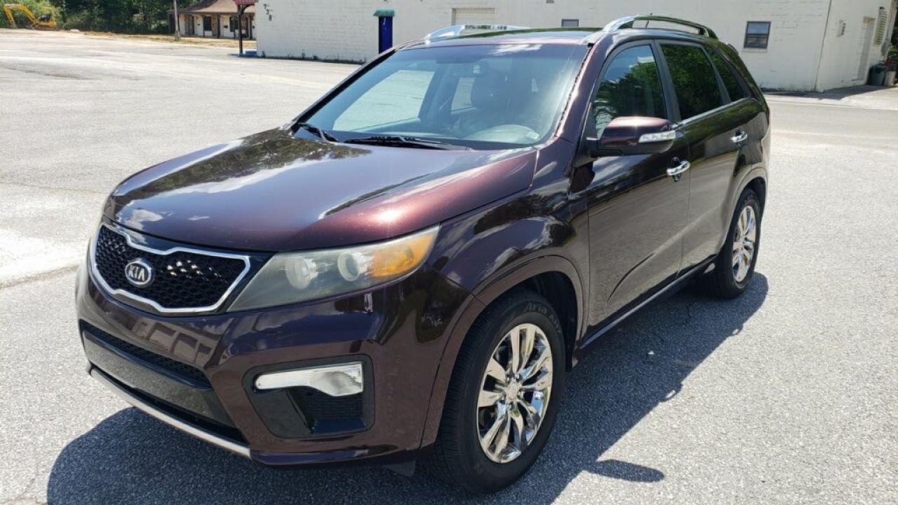 Photo 2 from auction – 2011 KIA SORENTO SX with VIN 5XYKW4A2XBG131304