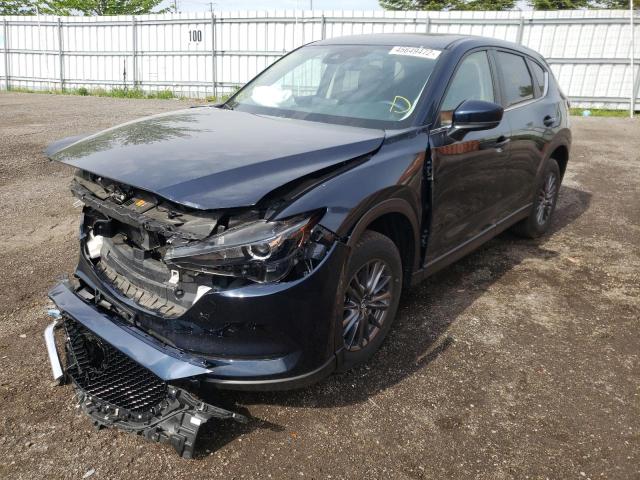 Photo 2 from auction – 2021 MAZDA CX-5 TOURI with VIN JM3KFACM4M1123710