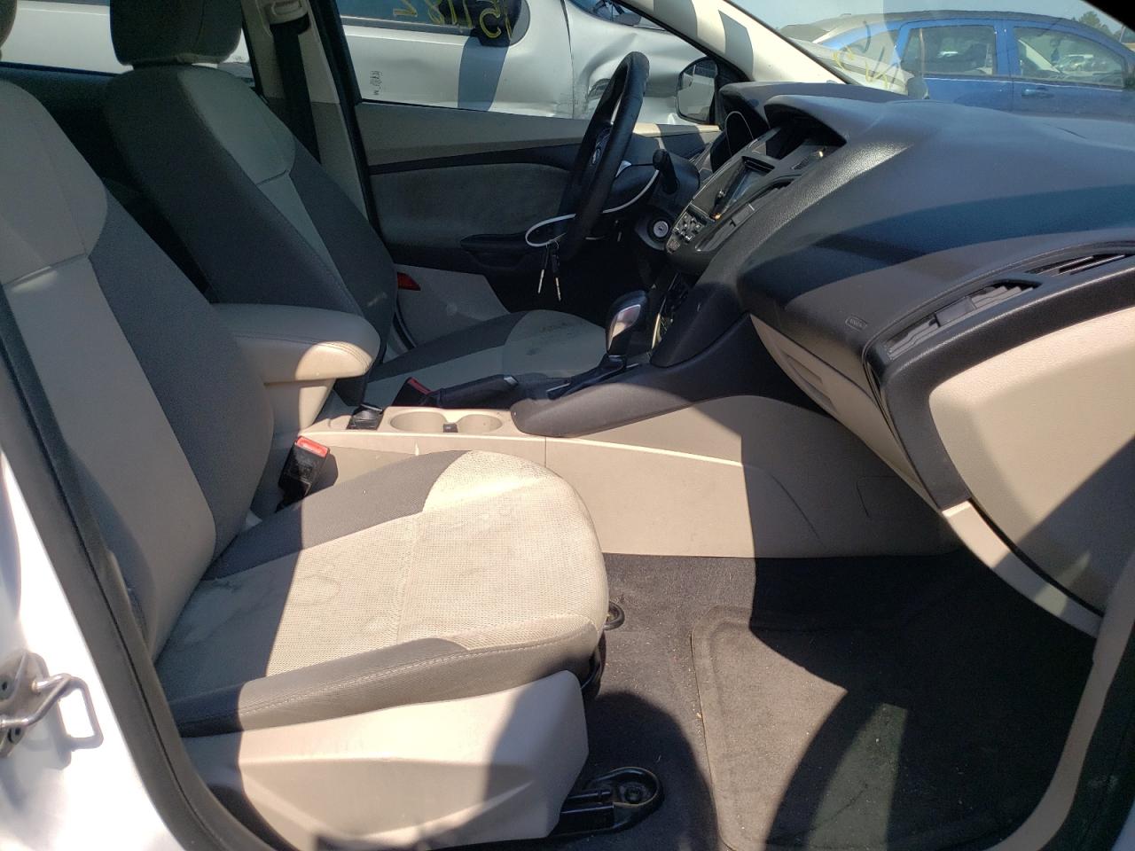 Photo 18 from auction – 2013 FORD FOCUS SE with VIN 1FADP3F20DL288331
