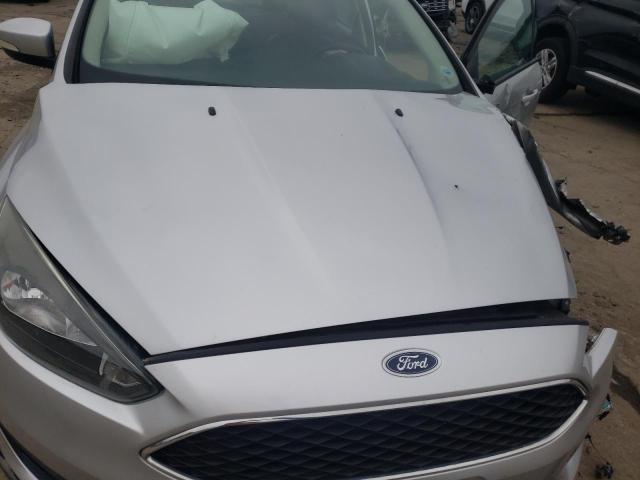 Photo 7 from auction – 2015 FORD FOCUS SE with VIN 1FADP3F22FL319243