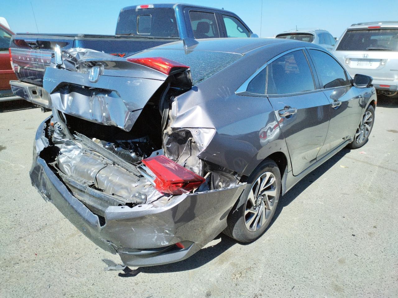 Photo 16 from auction – 2017 HONDA CIVIC EX with VIN 2HGFC2F84HH565225