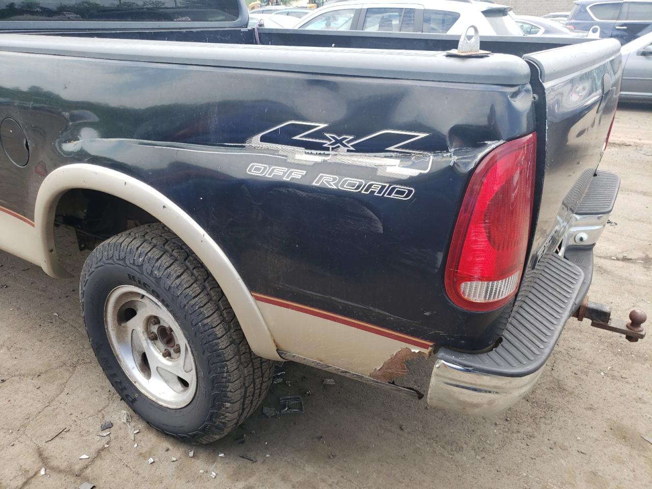 Photo 9 from auction – 2000 FORD F-150 with VIN 1FTRX18L6YNA76313