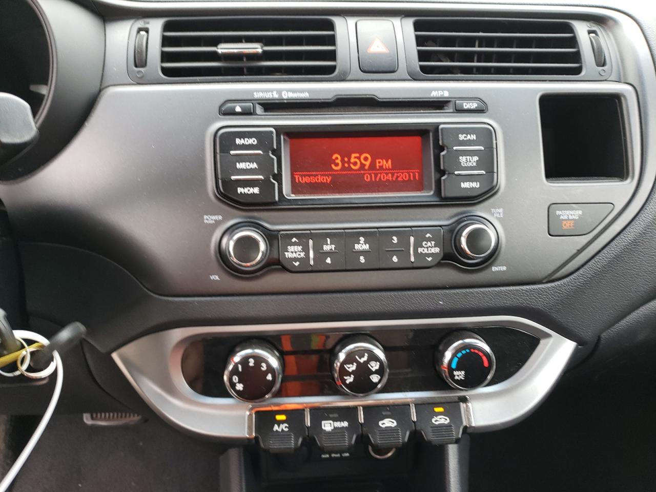 Photo 9 from auction – 2012 KIA RIO EX with VIN KNADN4A37C6049777