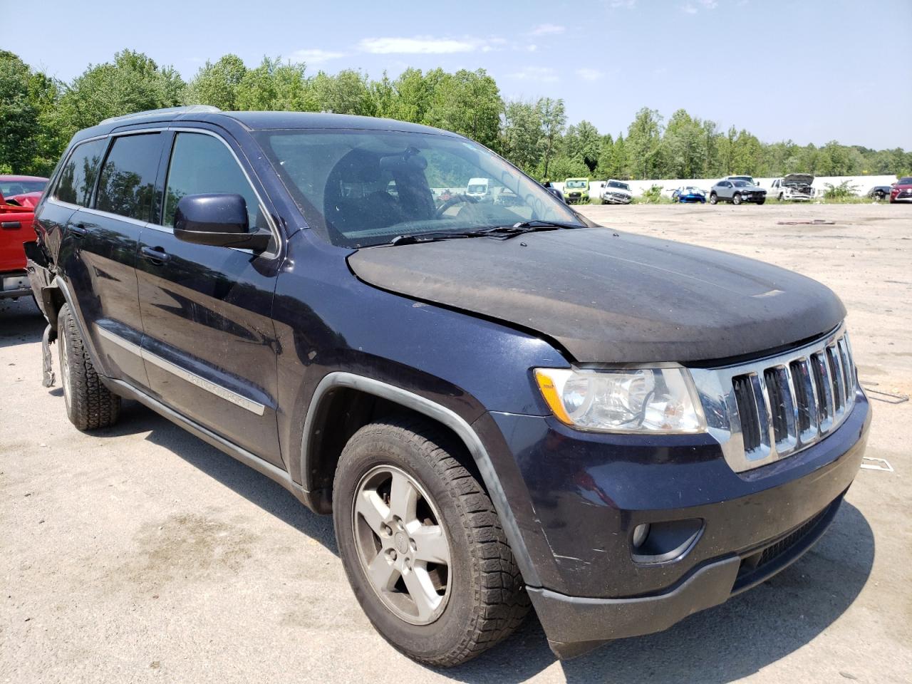 JEEP GRAND CHER 2011 with VIN 1J4RR4GG8BC552977 - Photo from auction