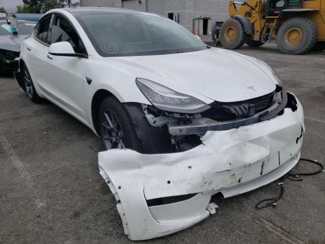 TESLA MODEL 3 2021 with VIN 5YJ3E1EB9MF928198 - Photo from auction
