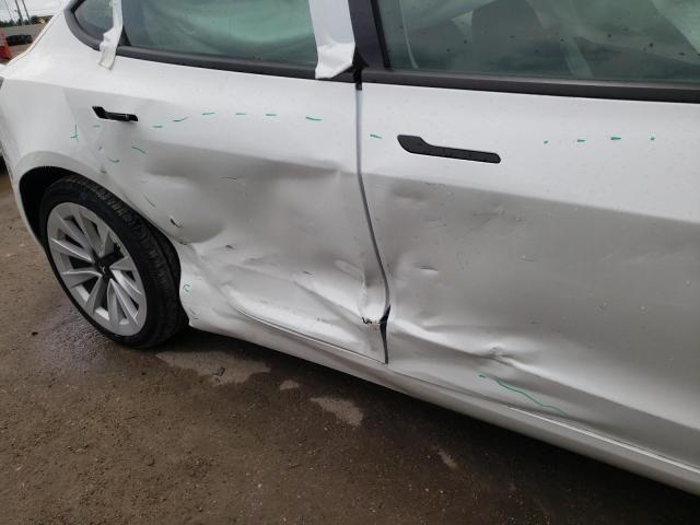 Photo 9 from auction – 2021 TESLA MODEL 3 with VIN 5YJ3E1EA5MF990852