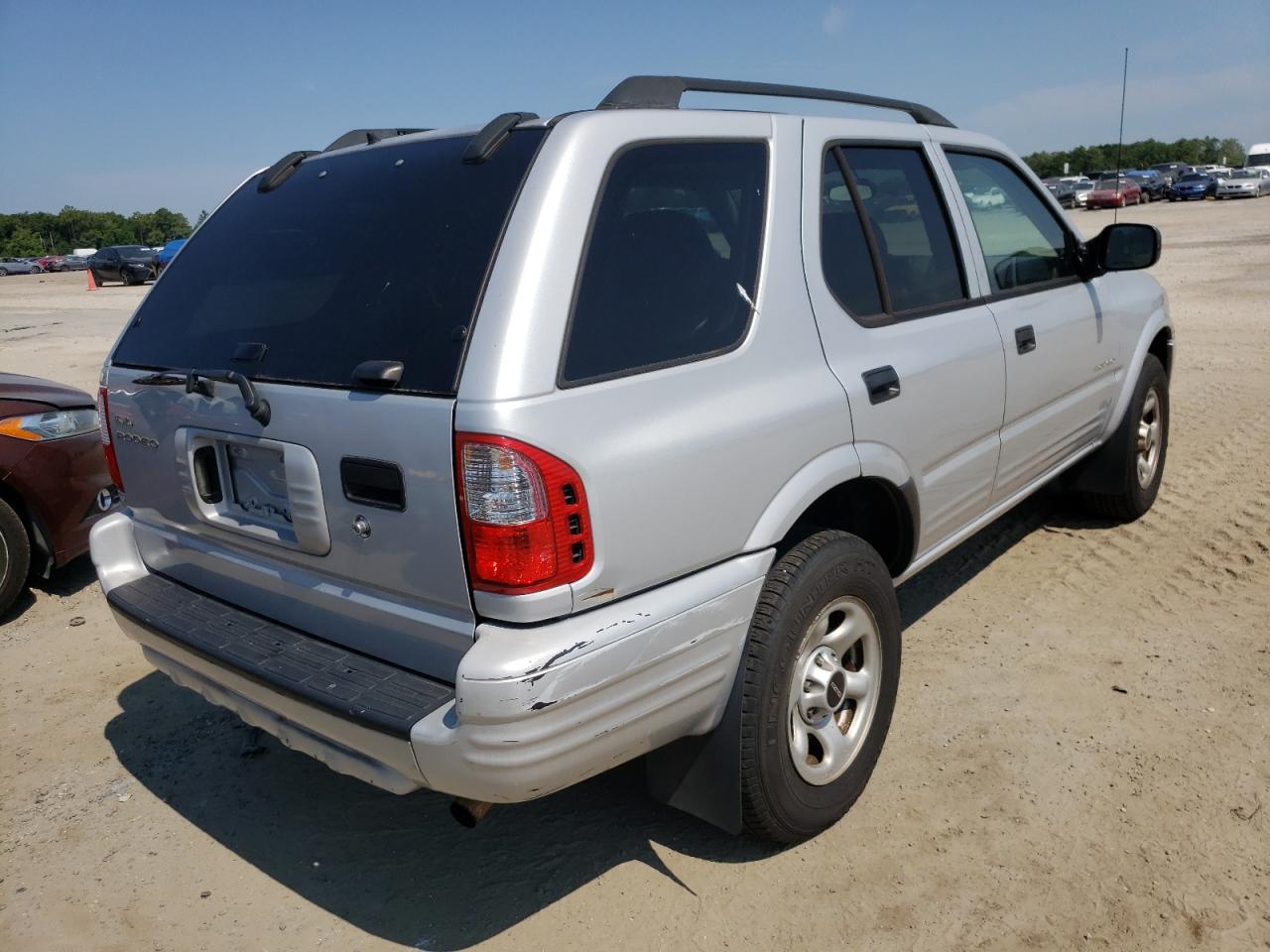 Photo 4 from auction – 2003 ISUZU RODEO S with VIN 4S2CK58D034304555