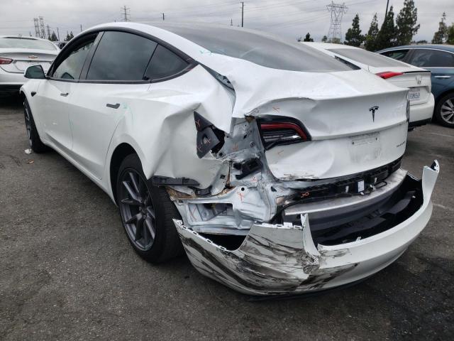 Photo 3 from auction – 2021 TESLA MODEL 3 with VIN 5YJ3E1EB9MF928198