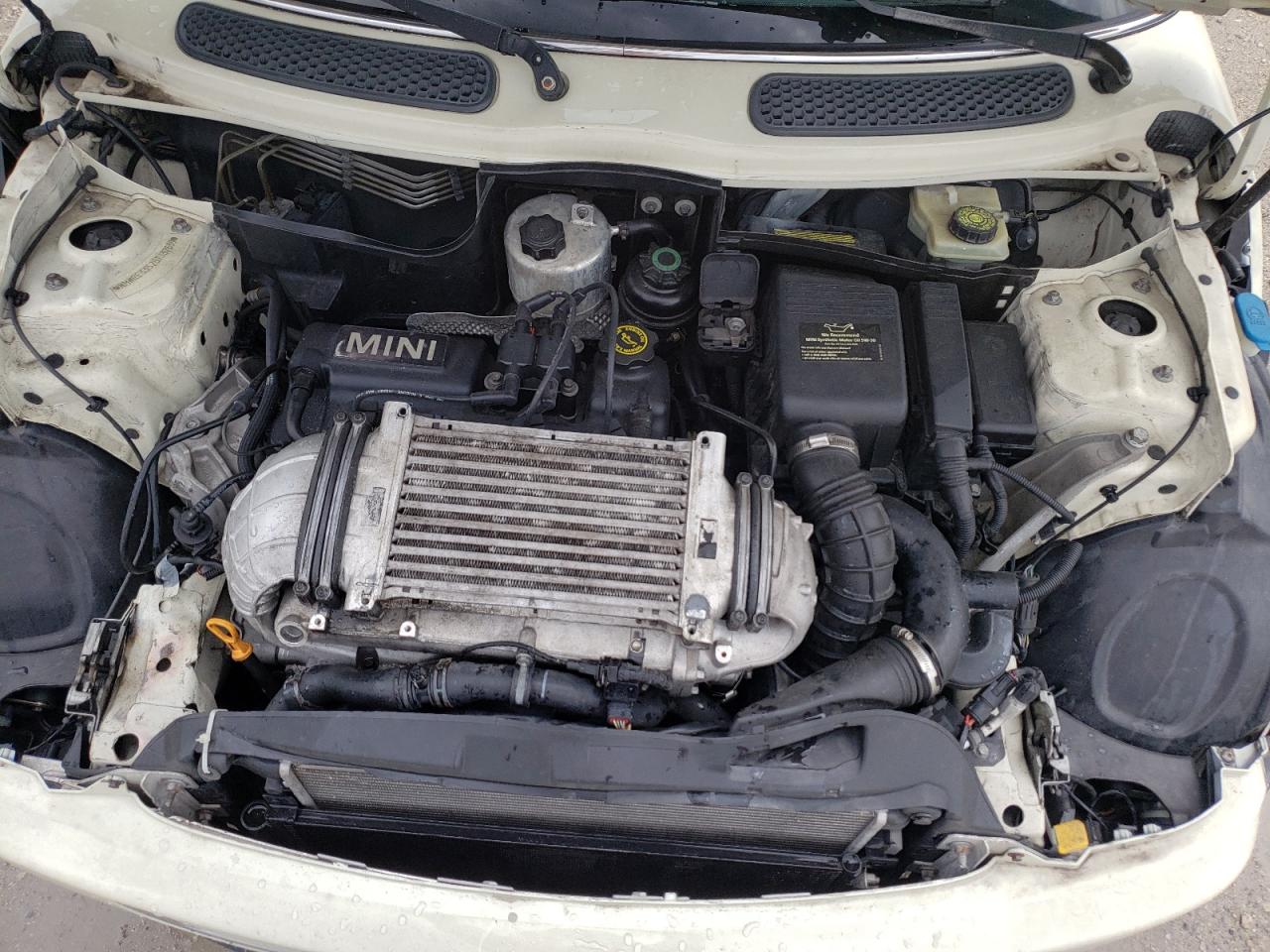 Photo 12 from auction – 2006 MINI COOPER S with VIN WMWRE33526TJ37639