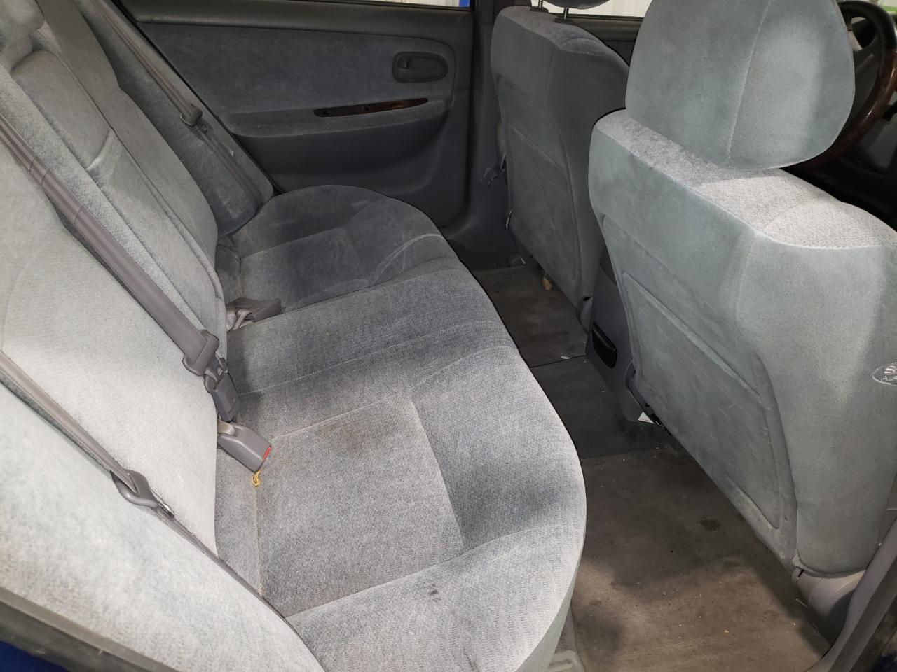 Photo 6 from auction – 2004 KIA OPTIMA LX with VIN KNAGD128045333901