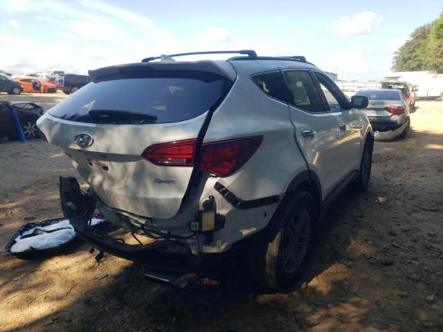 Photo 4 from auction – 2017 HYUNDAI SANTA FE S with VIN 5NMZU3LB1HH022014