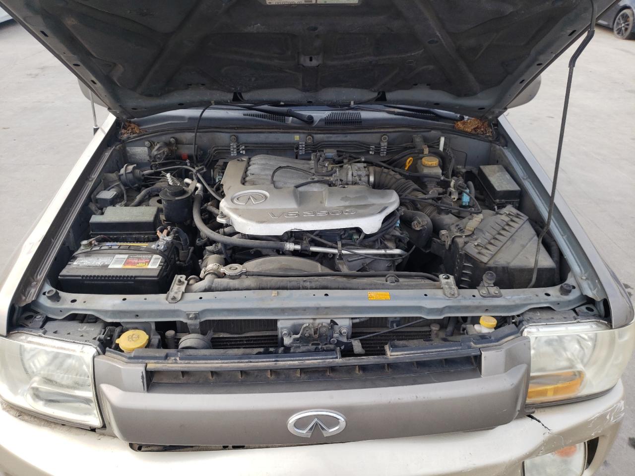 Photo 7 from auction – 2002 INFINITI QX4 with VIN JNRDR09X22W213149