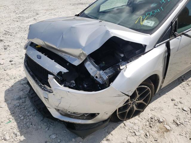 Photo 9 from auction – 2017 FORD FOCUS SE with VIN 1FADP3FE5HL260041