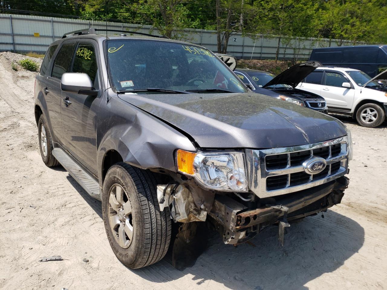 FORD ESCAPE LIM 2011 with VIN 1FMCU9EG7BKA02830 - Photo from auction
