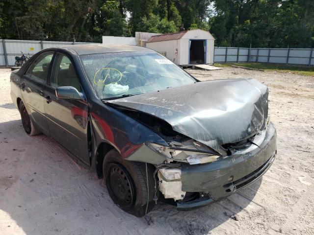 TOYOTA CAMRY LE 2002 with VIN JTDBE32K420007742 - Photo from auction