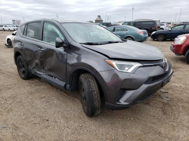 TOYOTA RAV4 LE 2018 with VIN 2T3ZFREV1JW451563 - Photo from auction