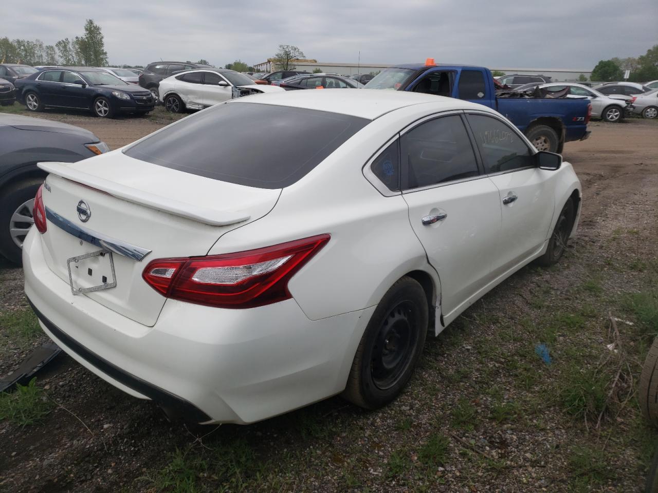 Photo 4 from auction – 2016 NISSAN ALTIMA 2.5 with VIN 1N4AL3AP1GC242772
