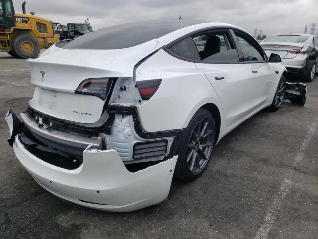 Photo 4 from auction – 2021 TESLA MODEL 3 with VIN 5YJ3E1EB9MF928198