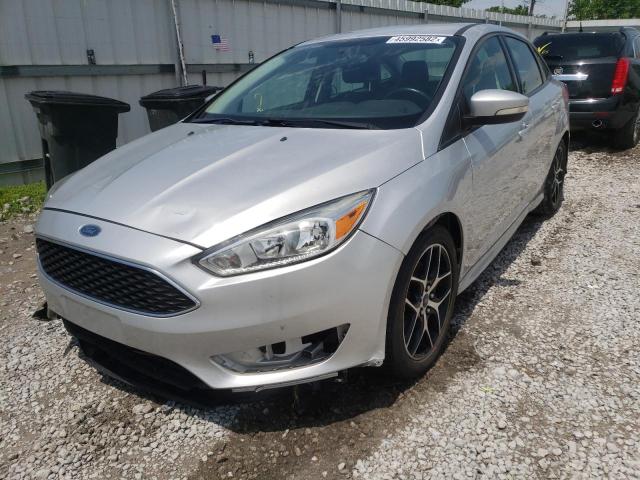 Photo 2 from auction – 2015 FORD FOCUS SE with VIN 1FADP3F21FL210062