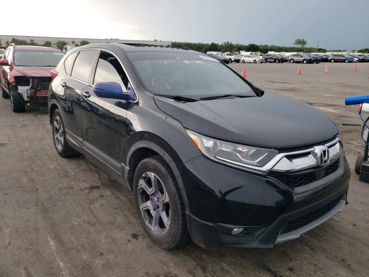 HONDA CR-V EXL 2017 with VIN 7FARW1H86HE018011 - Photo from auction