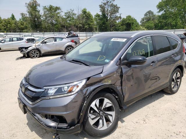 Photo 2 from auction – 2016 HONDA CR-V TOURI with VIN 5J6RM4H96GL062477