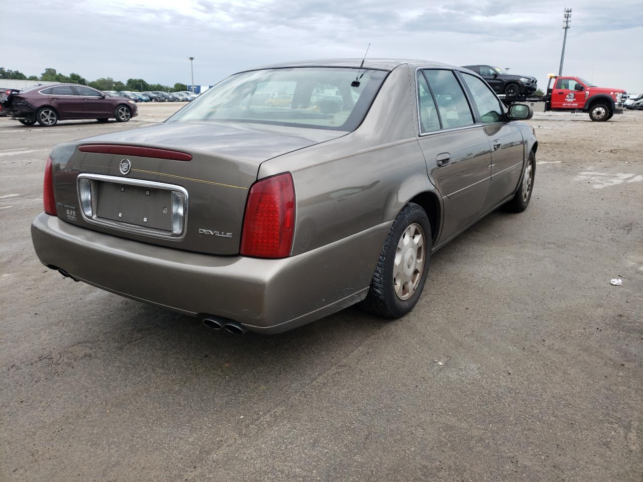 Photo 16 from auction – 2002 CADILLAC DEVILLE with VIN 1G6KD54Y62U236256