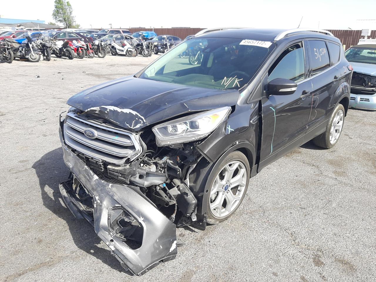 Photo 2 from auction – 2019 FORD ESCAPE TIT with VIN 1FMCU0J90KUA26863