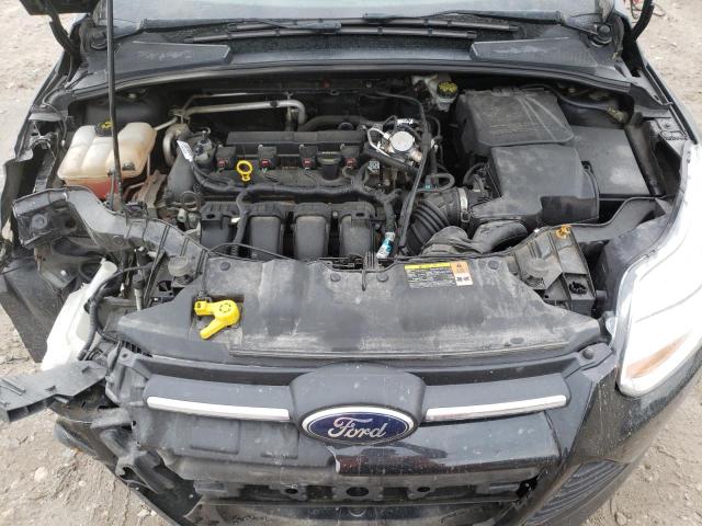 Foto 7 de la subasta – 2014 FORD FOCUS SE con VIN 1FADP3F21EL257218