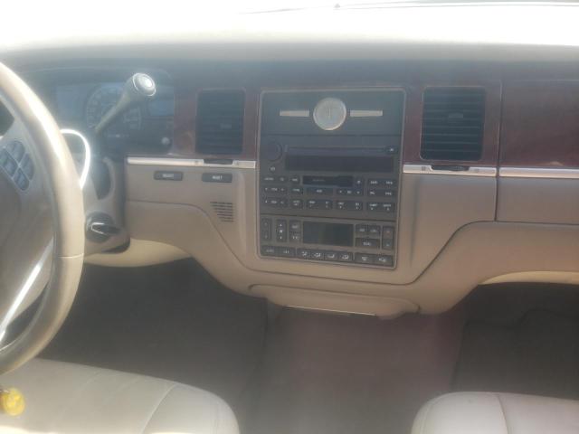 Photo 9 from auction – 2004 LINCOLN TOWN CAR E with VIN 1LNHM81W14Y609433