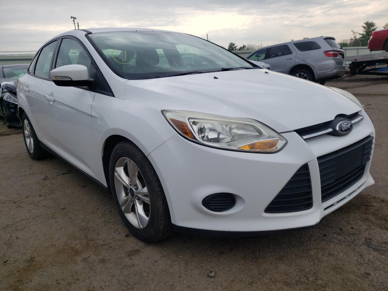 FORD FOCUS SE 2014 with VIN 1FADP3F23EL279463 - Photo from auction