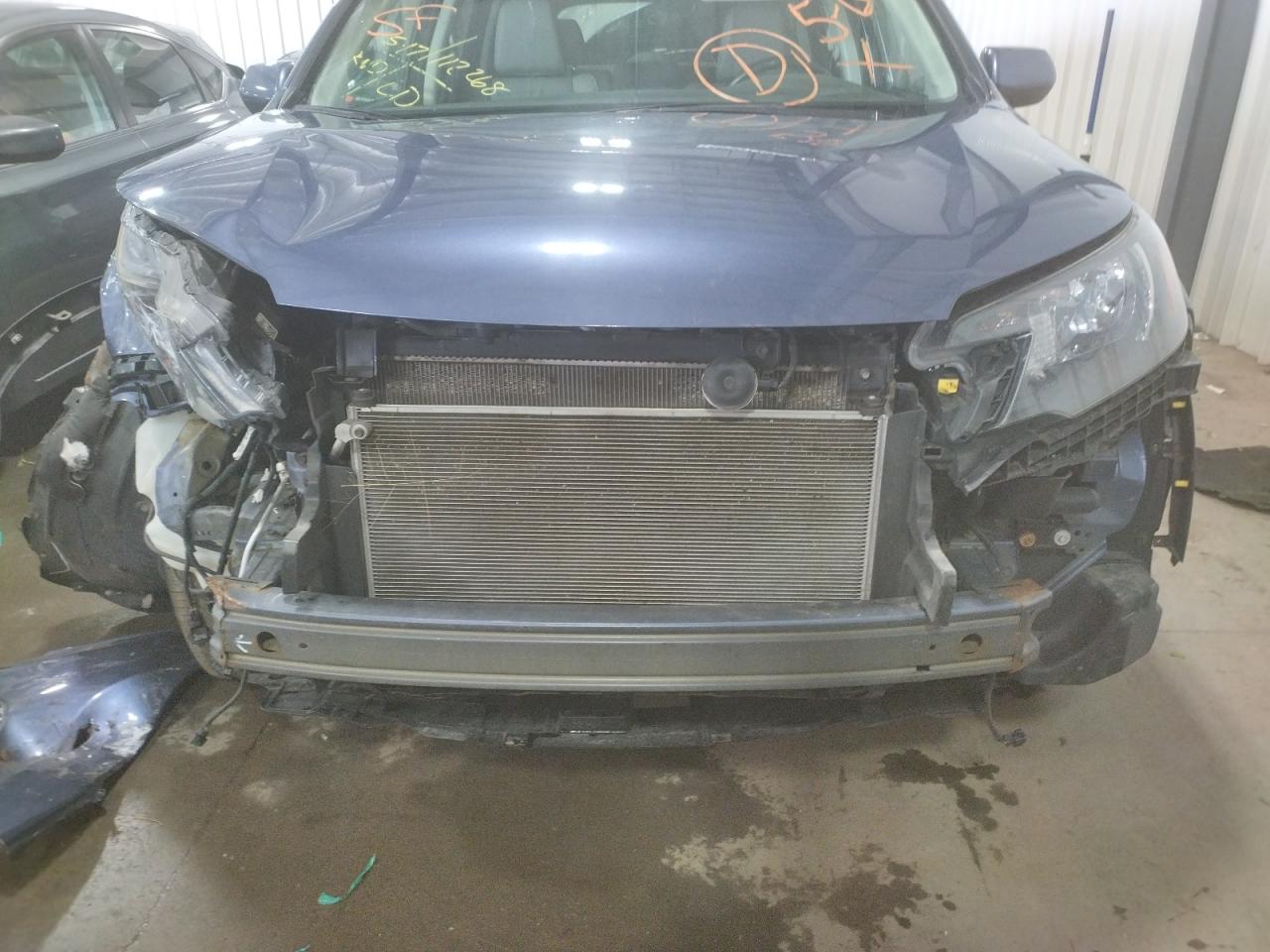 Photo 17 from auction – 2013 HONDA CR-V EXL with VIN 5J6RM4H71DL059870