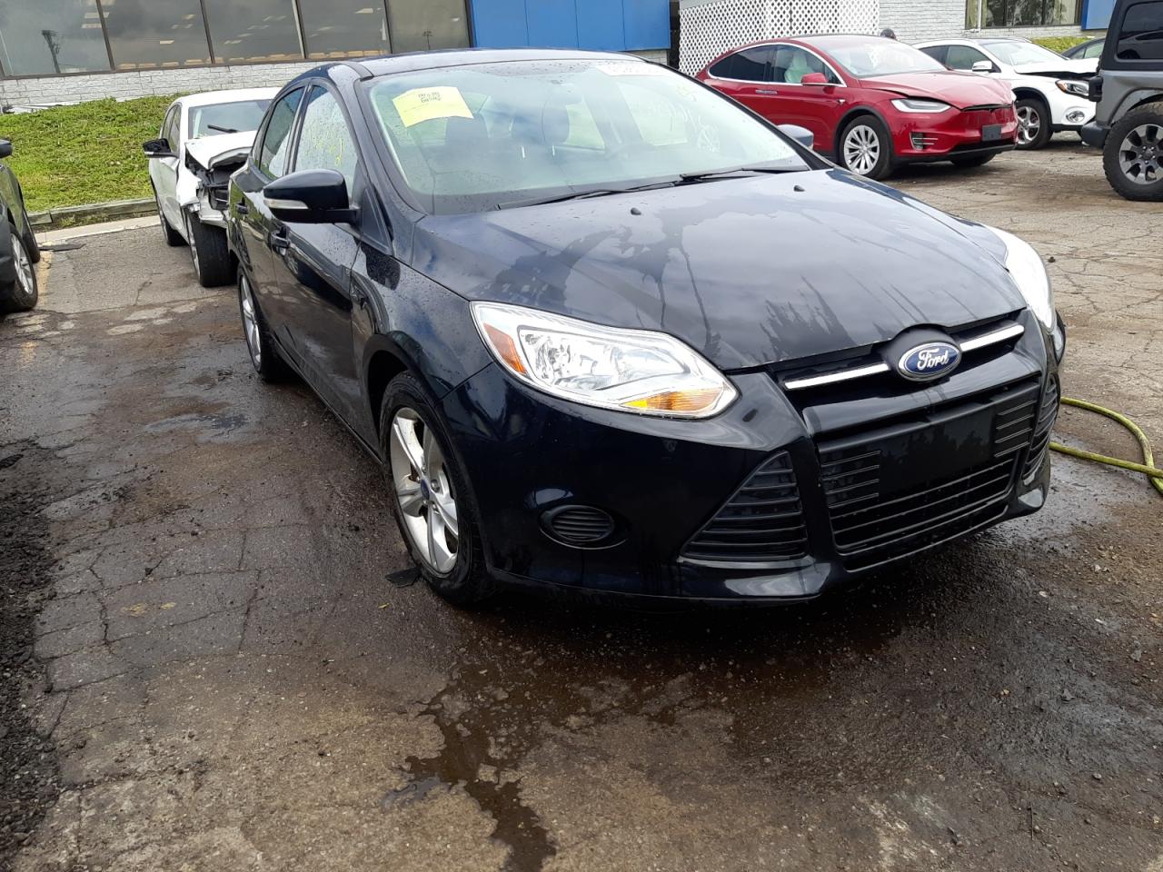 FORD FOCUS SE 2014 with VIN 1FADP3F20EL316601 - Photo from auction