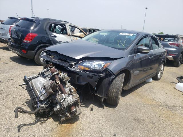 Photo 2 from auction – 2014 FORD FOCUS TITA with VIN 1FADP3J2XEL320338