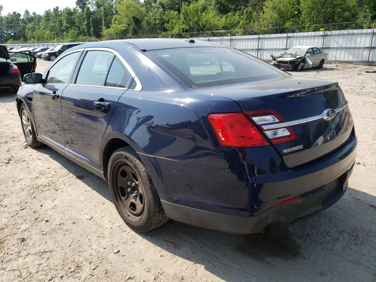 Photo 3 from auction – 2016 FORD TAURUS POL with VIN 1FAHP2L80GG111862
