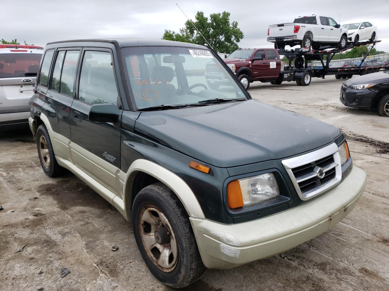 SUZUKI SIDEKICK S 1998 with VIN JS3TE21V9W4100203 - Photo from auction