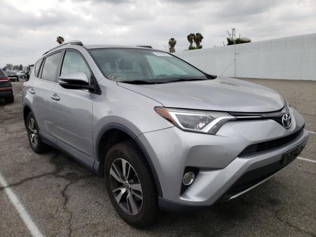 TOYOTA RAV4 XLE 2016 with VIN 2T3WFREV9GW281013 - Photo from auction